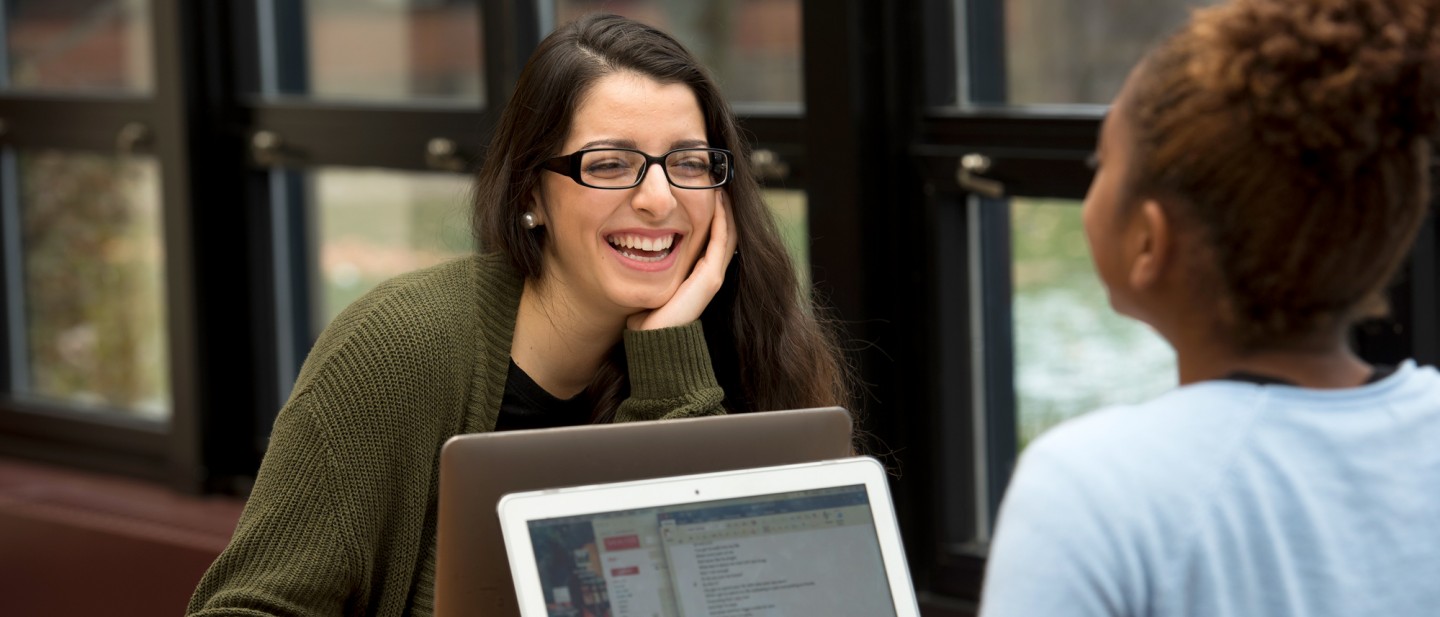 Two Seton Hill students smiling 