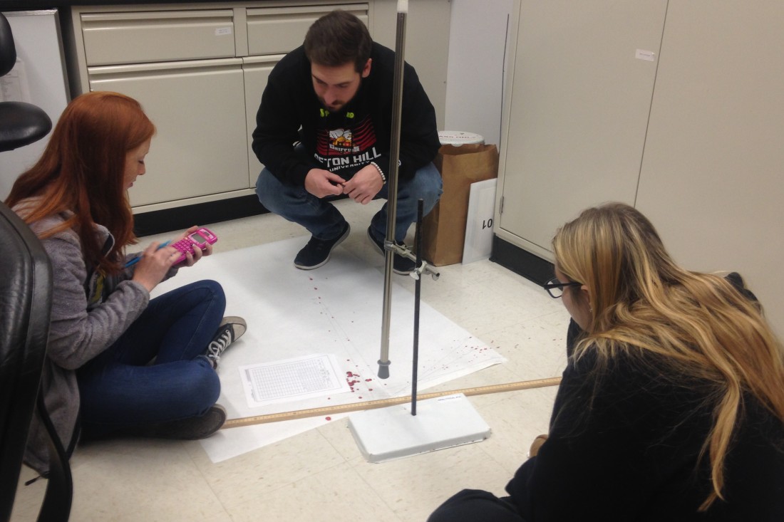 Forensic science students using the string method