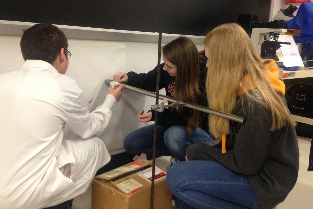 Forensic science students using the string method