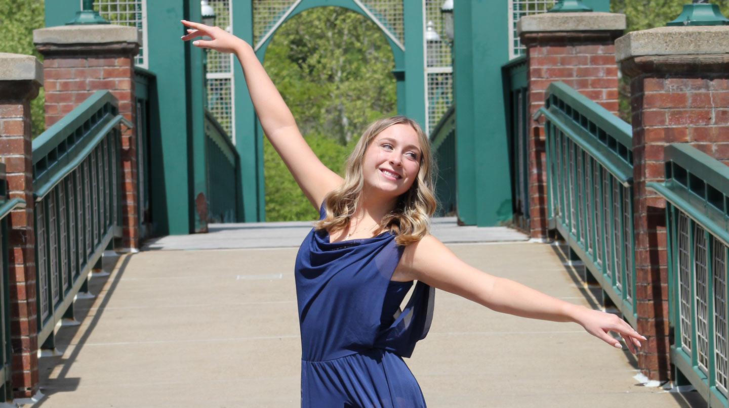 Bridget Joyce dancing on a bridge